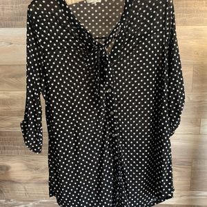 Black shirt with white polka dot